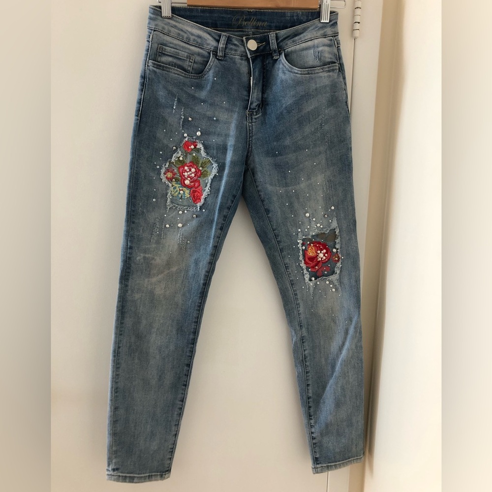 Chambray blue mid-rise slim Ankle Jeans with Floral Embroidery and pearls.